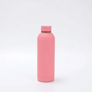 Detailed close-up view of a sleek pink stainless steel insulated water bottle flask