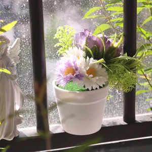 Artificial daisy and peony flower pot decoration in minimalist white planter for home