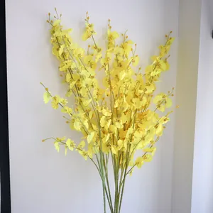 Close-up detail of yellow silk Dancing Lady Orchid flowers for wedding scene decoration