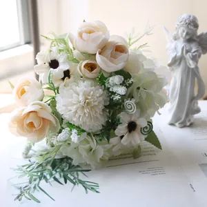 Detail shot of white artificial tea rose and hydrangea bouquet for elegant home decor