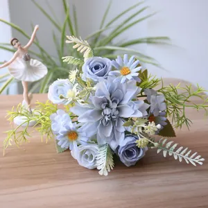 Detailed macro view of artificial silk dahlia and rose bouquet