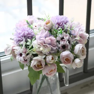 Close-up of artificial hydrangea and daisy bouquet in soft purple and pink tones