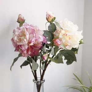 Detailed view of realistic pink and white artificial peony silk flowers bouquet