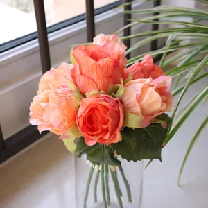 Detailed macro view of artificial orange rose bouquet for home and wedding decoration