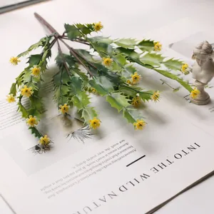 Close-up of artificial crab cactus plant with realistic green leaves and yellow flowers