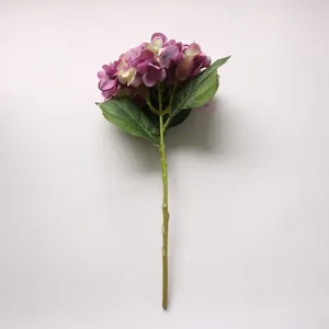 Detailed macro view of a single purple artificial hydrangea stem for wedding home decor