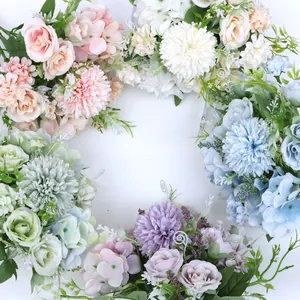 Detailed top view of assorted colorful artificial rose and hydrangea bouquets in a circle