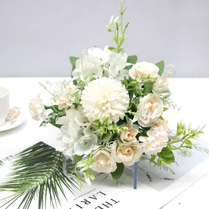 Close-up of Nordic style artificial bouquet with cream roses and hydrangeas for decor.