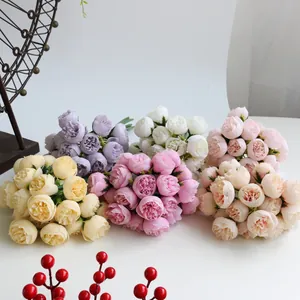 Detailed view of artificial tea rose bouquets in six different vibrant colors for decor