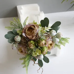 Detailed view of vintage pink artificial Penglai Peony bouquet with realistic silk petals