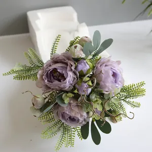 Close-up of purple artificial peony bouquet for elegant home tabletop decoration