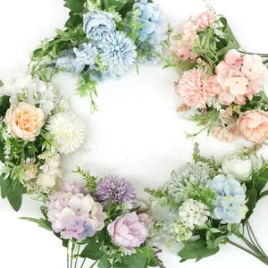 Top view of colorful artificial silk flower bouquets with roses and hydrangeas