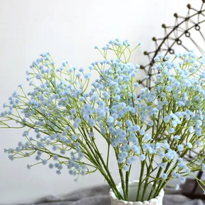 Close-up detail of realistic light blue artificial baby's breath flowers for decor