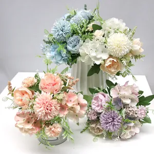 Detailed view of artificial peony and hydrangea bouquets for home decor