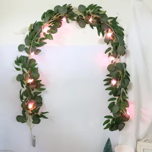 Artificial willow and eucalyptus leaf garland with warm star LED lights for decor
