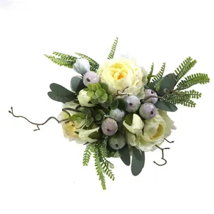 High-quality close-up detail of artificial peony bouquet with berries and lush greenery
