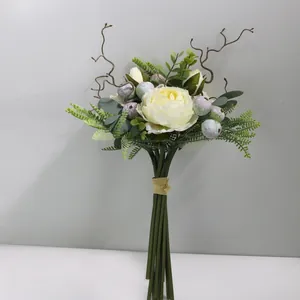 Detailed view of Nordic style cream white simulation peony bouquet with greenery