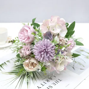 Detailed view of artificial floral bouquet with roses and hydrangeas for home decor
