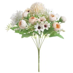 Detailed view of a synthetic mixed flower bouquet with cream roses and white hydrangeas