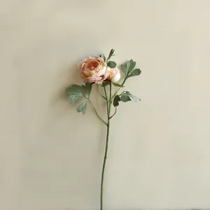 Detailed view of a 2-head pink silk ranunculus artificial flower for home decor