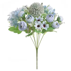 Detail view of a light blue and white artificial rose bouquet for home decoration