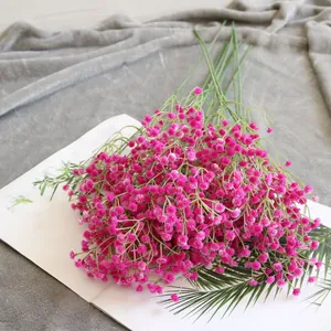 Detailed view of vibrant pink artificial baby's breath flower clusters for home decor