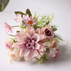 Close-up detail of a handmade pink dahlia and rose silk artificial flower bouquet
