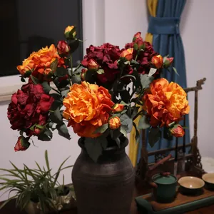 Elegant faux silk peony flower arrangement in a vintage ceramic vase for home decor