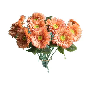 Elegant artificial orange gerbera daisy bouquet for home decoration and photo props.