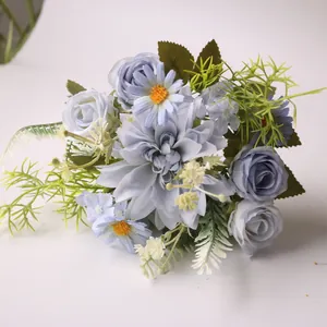 Close-up view of elegant light blue silk dahlia and daisy flower bouquet for weddings