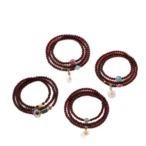 Bracelet en grenat naturel avec pendentifs Ping'an Kou en quartz rose et en jade