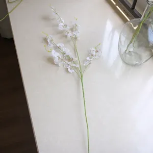 Detailed view of white five-branch artificial dancing orchid with realistic petals