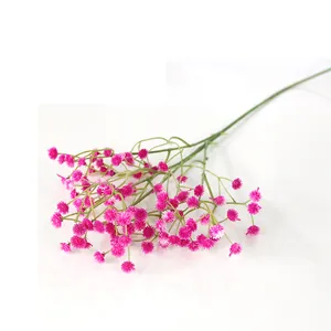 Detail of artificial magenta babysbreath stem with vibrant small floral clusters.