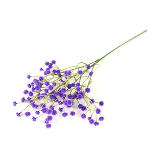 Close-up of a single purple artificial baby's breath flower stem for home decor.