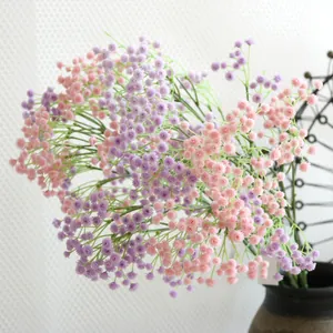 Detailed view of pink and purple artificial baby's breath flowers for home decoration