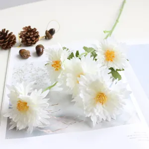 Detailed view of white artificial 5-head chrysanthemum flowers for wedding and home decor
