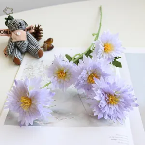 Detailed view of artificial purple chrysanthemums with five heads for home decor