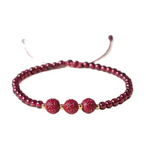 Bracciale di granato naturale e cinnabro con motivi intagliati stile cinese