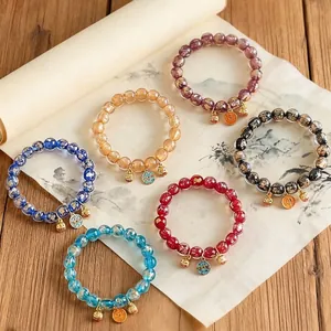 Set mit sechs bunten Weihrauchglas-Perlenarmbändern im orientalischen Stil für Glück