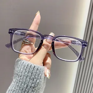 Detail view of transparent purple square frame reading glasses with stylish rivets