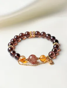 Detailed view of crystal bracelet featuring obsidian, super seven, and citrine beads.