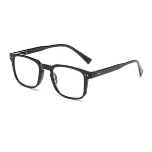 Macro view of retro black square-frame reading glasses with decorative silver rivets