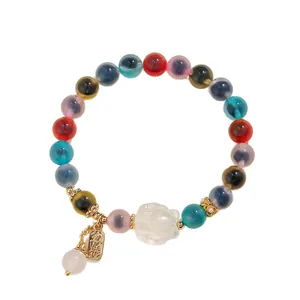 Armband mit bunten Achatperlen, weißem Kristall-Fuchs-Anhänger und Goldmarke