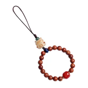 Traditional wooden bead charm with ceramic lucky cat pendant for bags and phone decoration.