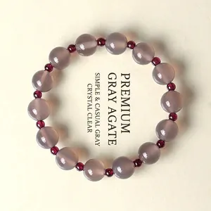 Elegante pulsera de ágata gris natural y granate rojo con cuentas translúcidas