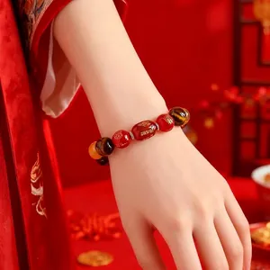 Bracelet élégant en agate rouge et œil de tigre avec symboles chinois traditionnels