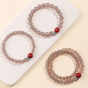 Elegant grijs agaat kralenarmband met rood steenaccent in traditionele Chinese stijl