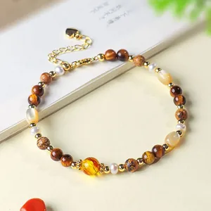 Armband met natuurlijke zoetwaterparels en tijgeroog met amber accent voor dames