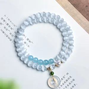 Eleganter zweireihiger Katzenaugenstein-Armband mit Perle und Achat-Donut-Anhänger