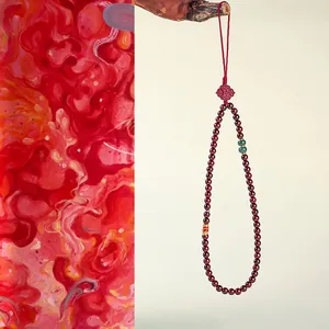 Exquisite red garnet beaded charm with golden koi fish and Chinese knot for bags
